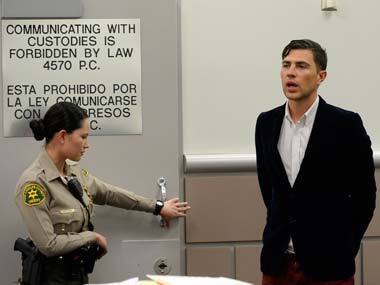  who attacked Brad Pitt  is led into the courtroom. AP 