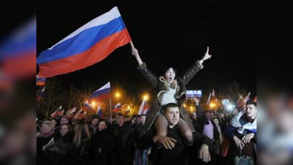 Indian, Chinese shares surge as global stocks move cautiously due to Ukraine's civil stir