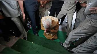 Image of the day: India's PM-elect, Narendra Modi, bows in front of Parliament 
