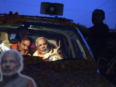 Narendra Modi during his final roadshow before polls are held in Varanasi. AFP.