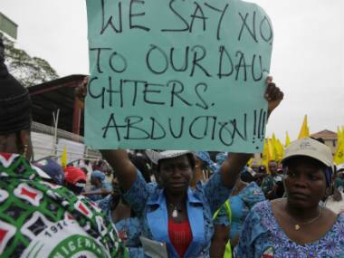 Women attend a demonstration calling on government to rescue kidnapped school girls of a government secondary school Chibok, in Lagos. AP 