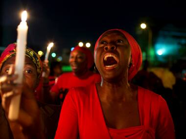 A woman at a protest march for the abducted schoolgirls. Reuters 