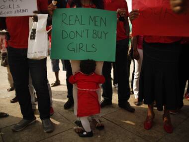 Nigerians take part in a protest, called by Malaga's Nigerian women Association, for the release of the abducted secondary school girls. Reuters