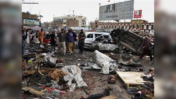 Bomb hits passenger mini-bus in NW Pakistan killing seven
