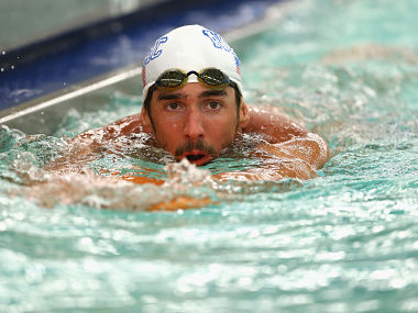 Swimming: Phelps steps up comeback with 100 butterfly win Swimming: Phelps steps up comeback with 100 butterfly win