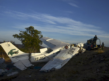 Air force plane with Laos defence minister onboard crashes Air force plane with Laos defence minister onboard crashes