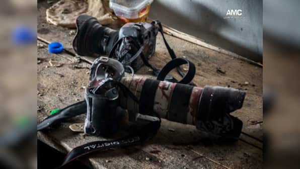 Israeli border police's bullets hit AP photographer, freelance journalist 