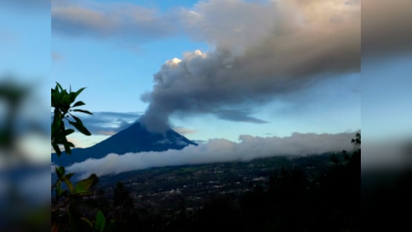 Thousands flee Bali over volcano eruption fears; Mount Agung belches smoke up to 700 metres
