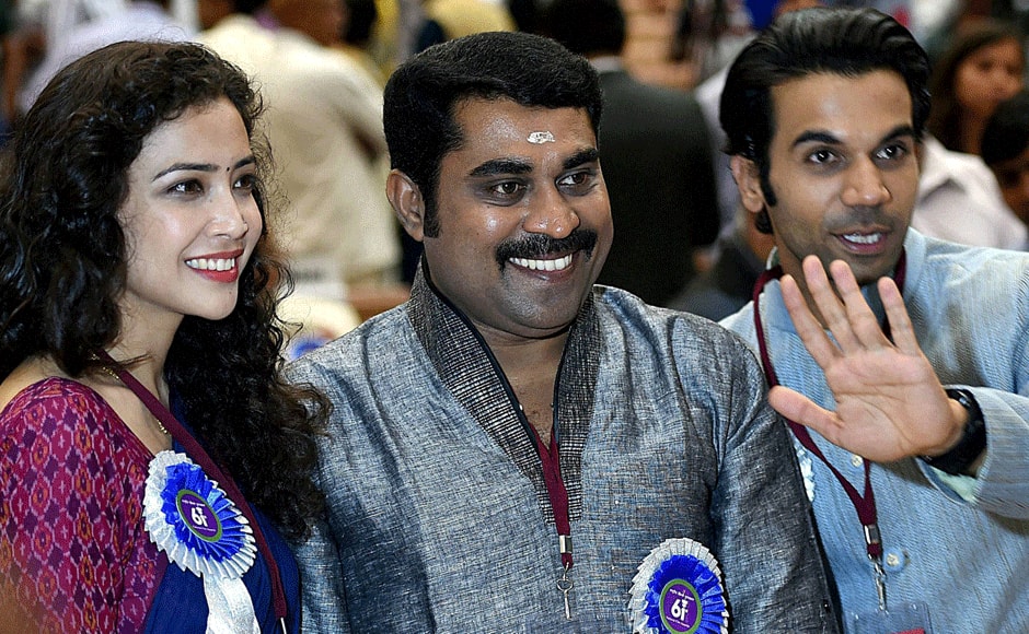 Best lead actress award winner Geetanjali Thapa with Best Actor (Shared) Suraj Venjaramoodu(C) and Raj Kumar poses for a group photo at the 61st National Film Awards 2013 function in New Delhi on Saturday. PTI