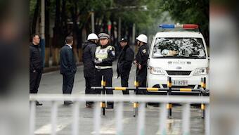 Amid tight security, shoppers return to Xinjiang market after attack