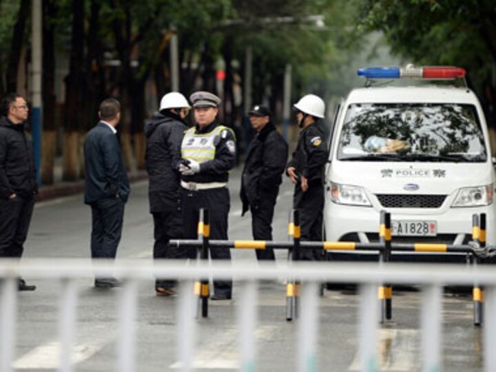 Amid tight security, shoppers return to Xinjiang market after attack