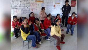 China: 60,000 orphans get free health insurance
