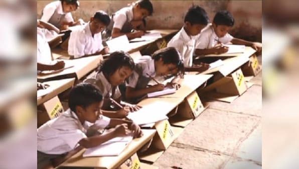 NGO makes portable desks from cartons for underprivileged kids