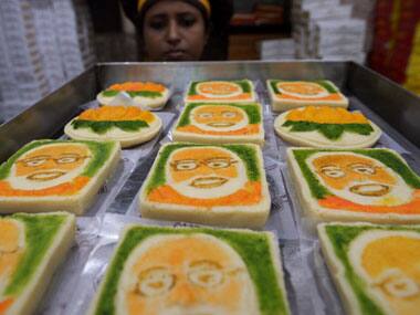 A Kolkata shop is selling sweet sondesh with a portrait of Modi embossed on it, ahead of the historic swearing-in. AFP