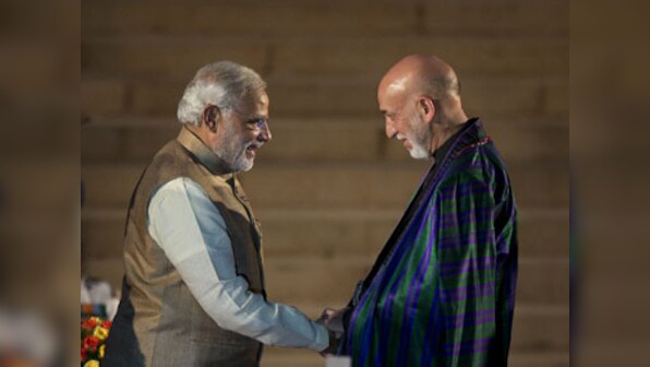 PM Modi, Sushma meet Karzai, discuss bilateral ties