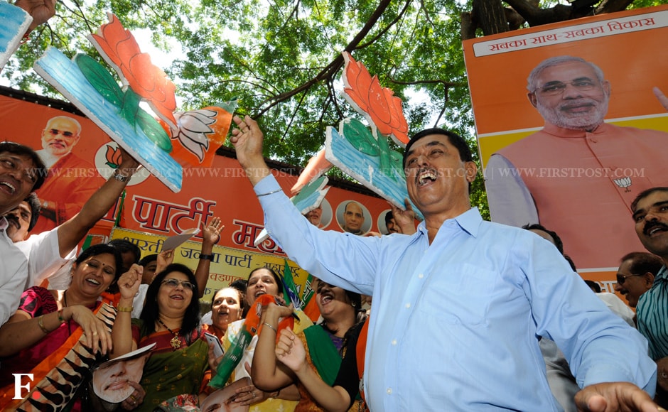 The BJP is all set to form a Modi-led government. Party workers waved the lotus symbol in celebration. Mexy Xavier/Firstpost The BJP is all set to form a Modi-led government. Party workers waved the lotus symbol in celebration. Mexy Xavier/Firstpost