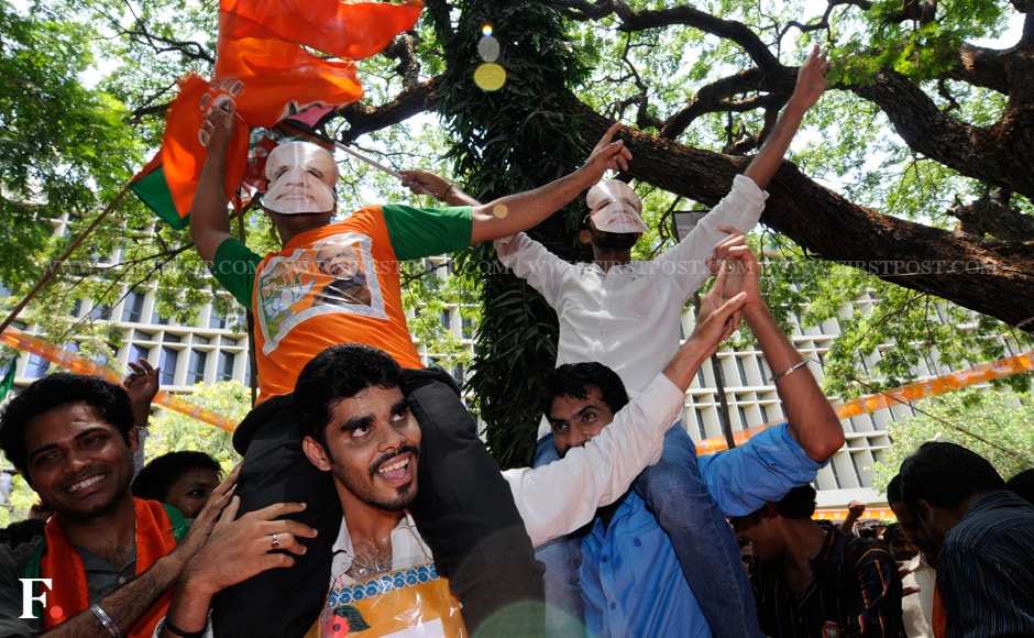 Celebrations continued as the election results kept pouring in, confirming the party's massive win in the 2014 Lok Sabha Elections. Mexy Xavier/Firstpost Celebrations continued as the election results kept pouring in, confirming the party's massive win in the 2014 Lok Sabha Elections. Mexy Xavier/Firstpost