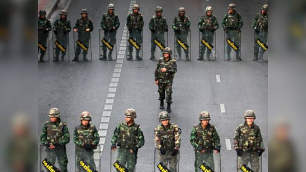 Thai Junta bans anti-coup protests, rebels call for mass rally