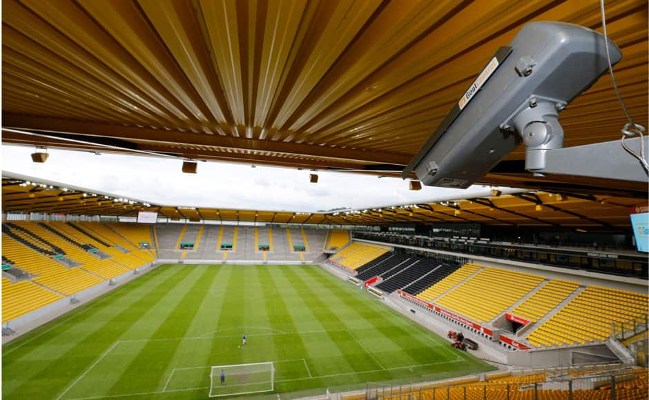 General view of a GoalControl goal line technology (GLT) high-speed camera at the Tivoli stadium during a demonstration of the GLT in the western German city of Aachen May 28, 2014. German firm GoalControl has been appointed by FIFA as the official provider for the goal-line technology at the upcoming 2014 soccer World Cup in Brazil. GoalControl uses 14 high-speed cameras around the pitch as part of its GoalControl-4D system, which are fixed in elevated positions around each goalmouth. The ball's position is continuously captured in three dimensions - X, Y and Z coordinates. All the cameras are linked to a computer processing system, which filters out players, the referee and any other objects. Only the ball remains, with its position precise to a few millimetres in the coordinate system of the pitch, according to the GoalControl website. The watch will be worn by referees and will display the word 