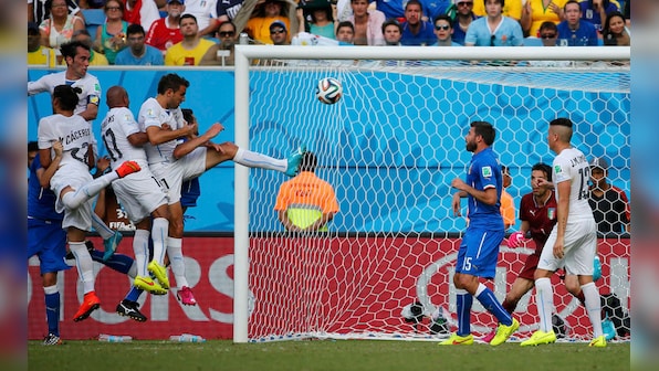 Photos: Suarez bite, Marchisio red card define ill tempered Italy-Uruguay game