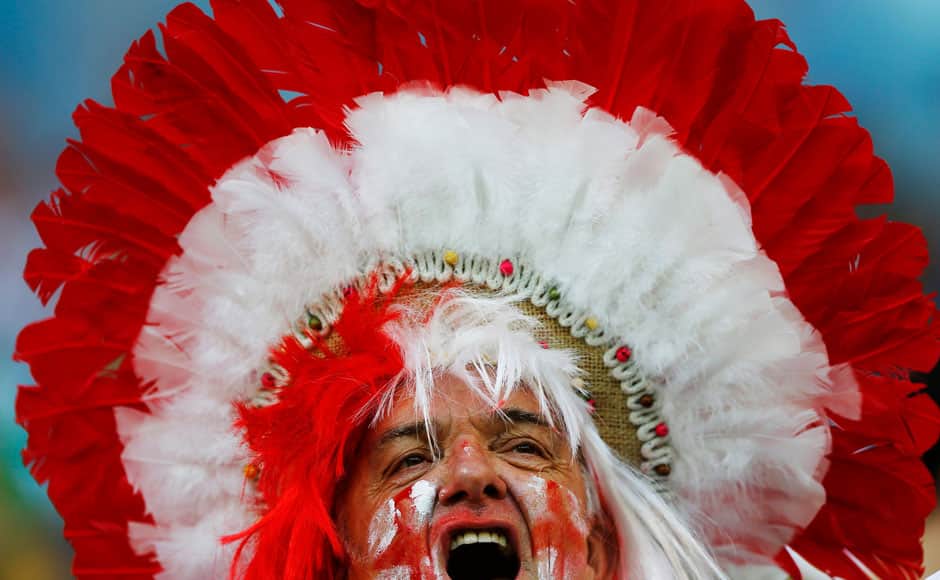 A fan of England waits for the start of their 2014 World Cup Group D soccer match against Italy at the Amazonia arena in Manaus June 14, 2014. REUTERS
