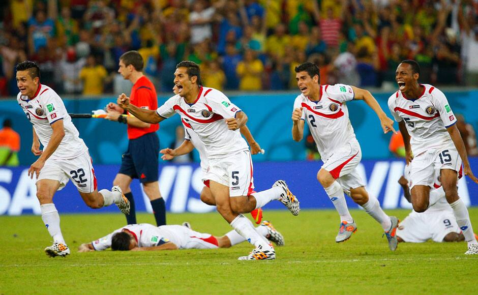 Costa Rica's players celebrate winning their 2014 World Cup round of 16 game against Greece at the Pernambuco arena in Recife June 29, 2014. REUTERS