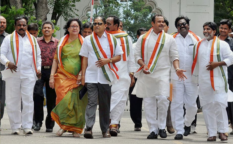 Congress members arrive at the first session of Telangana Assembly, in Hyderabad on Monday. PTI 