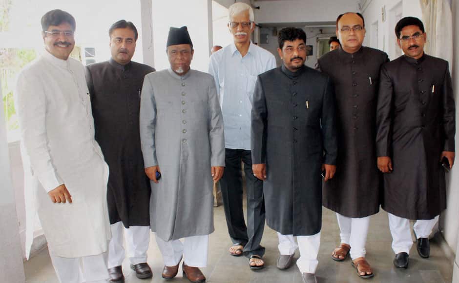 MIM members arrive at the first session of Telangana Assembly, in Hyderabad on Monday. PTI