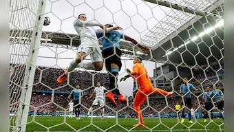 World Cup photos: Rooney finally scores but Suarez steals the show