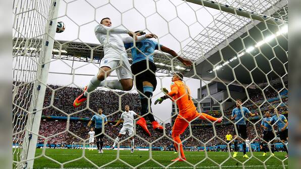 World Cup photos: Rooney finally scores but Suarez steals the show