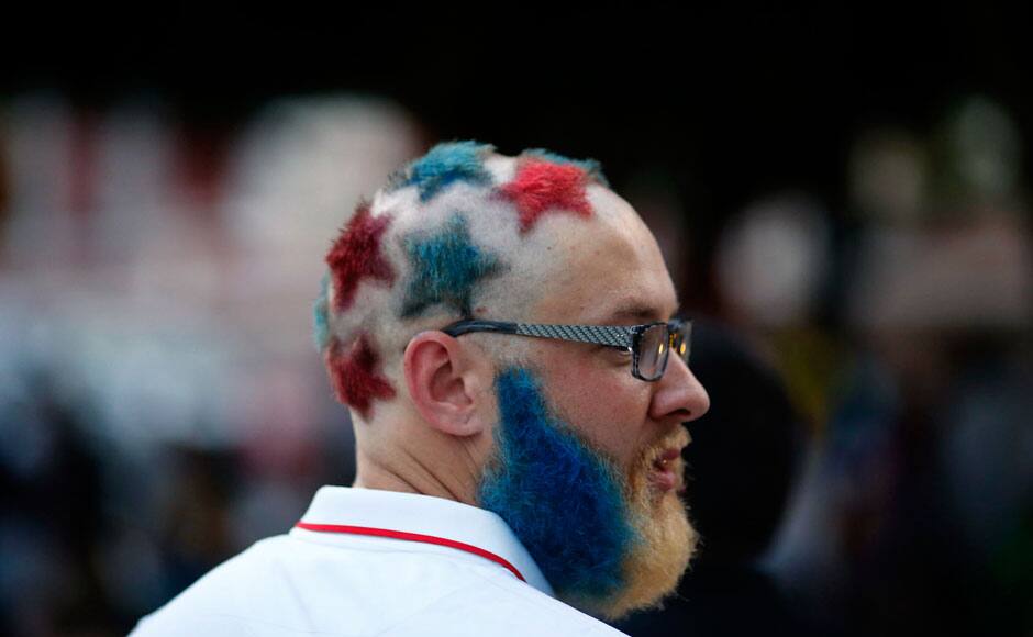 A U.S. fan watches a public screening of the 2014 World Cup soccer match against Ghana, in Manaus June 16, 2014. REUTERS