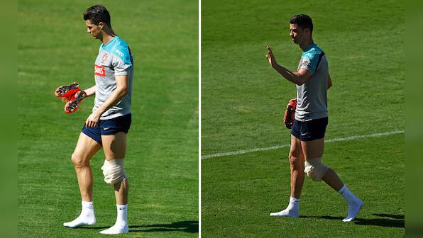 Photos: Portugal holds its breath as Ronaldo limps out of training