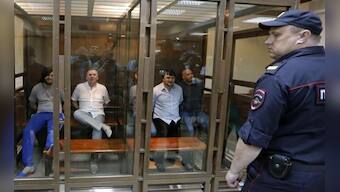 Five jailed for murder of Russian reporter, but son asks: on whose orders?
