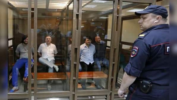 Five jailed for murder of Russian reporter, but son asks: on whose orders?