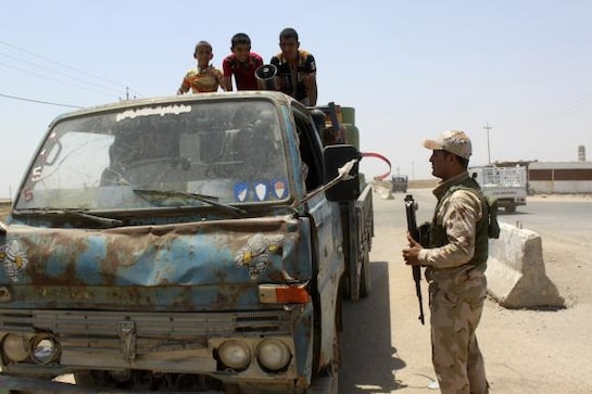 Iraqi army presses Tikrit assault as lawmakers scramble to fill posts Iraqi army presses Tikrit assault as lawmakers scramble to fill posts