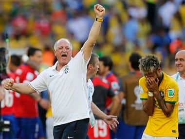Brazil's coach Luiz Felipe Scolari, left, and Brazil's Neymar react to the win. AP