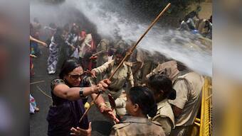 Police use water cannons on protesters outside Akhilesh's house