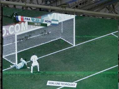The recording of the goal line technology is shown on a screen. AP