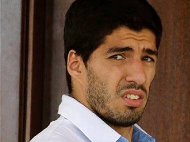 Uruguay's Luis Suarez looks out from his hotel in Natal, Brazil, Wednesday, June 25. AP