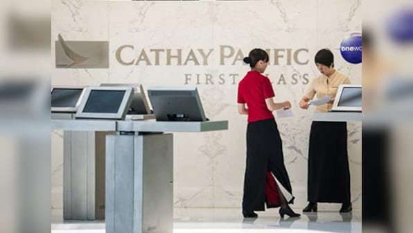 Cathay Pacific asks 27,000 employees to take unpaid leave as virus hits demand; says conditions as grave as 2009 financial crisis