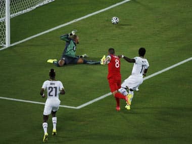Ghana's goalkeeper Adam Kwarasey concedes a goal by Clint Dempsey (2nd R) of the U.S. during their 2014 World Cup Group G soccer match at the Dunas arena in Natal. Reuters