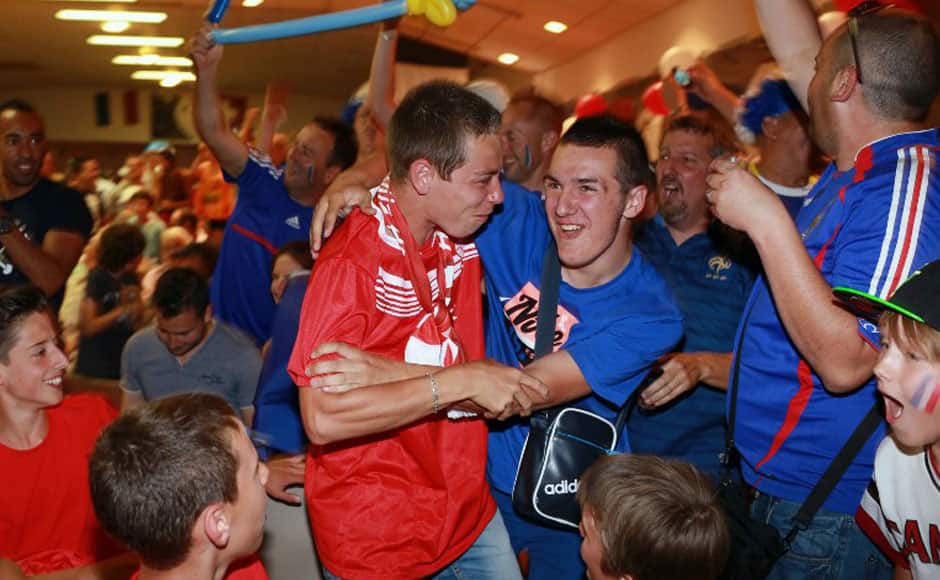 France fans reveled in the win while Switzerland fans had a night to forget after receiving a hammering. AFP