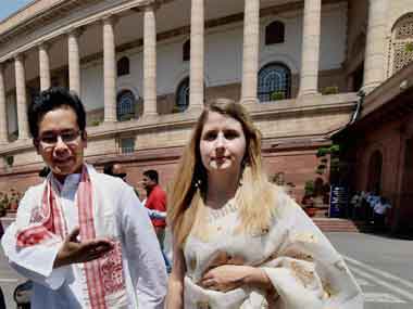 Congress MP Gaurav Gogoi with his wife Elizabeth Colebourn Gogoi at Parliament House on the 1st session of 16th Lok Sabha in New Delhi on Thursday. PTI 