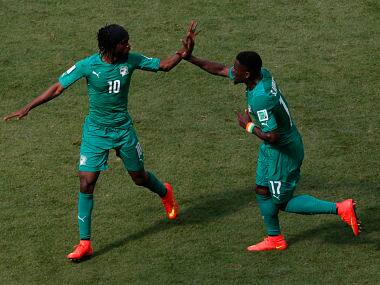 Ivory Coast's Gervinho (L) celebrates with teammate Serge Aurier after scoring against Colombia. Reuters