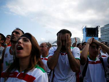 Iran partially opens stadium doors to women and families for male sporting events