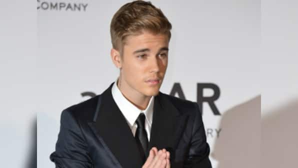 Bieber is not a racist but a naive child, says Usher