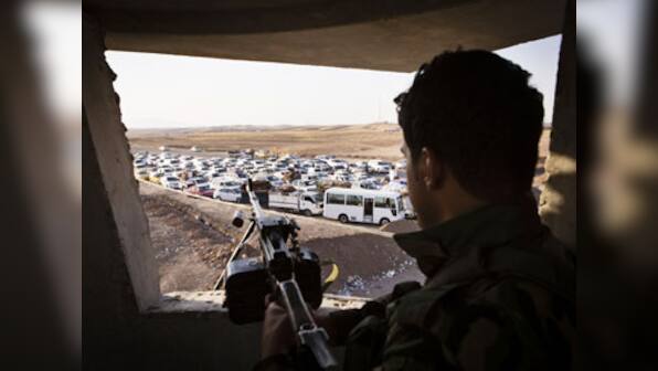 Militant groups take control of city in Iraq's northern province