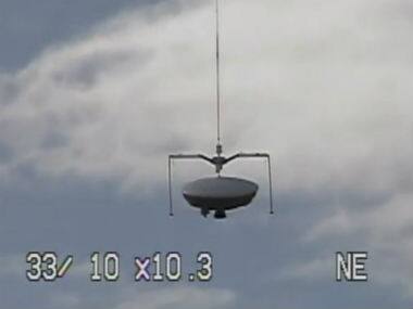 This image taken from video provided by NASA shows the launch of the high-altitude balloon carrying this saucer-shaped vehicle for NASA. AP 