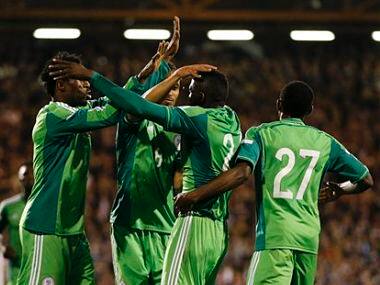 Nigeria's Uche Nwofor, second right, celebrates after he scores a goal during the international friendly soccer match between Nigeria and Scotland. AP