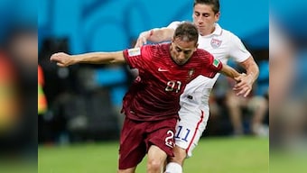 Varela, Ronaldo make last minute magic to keep Portugal's World Cup alive